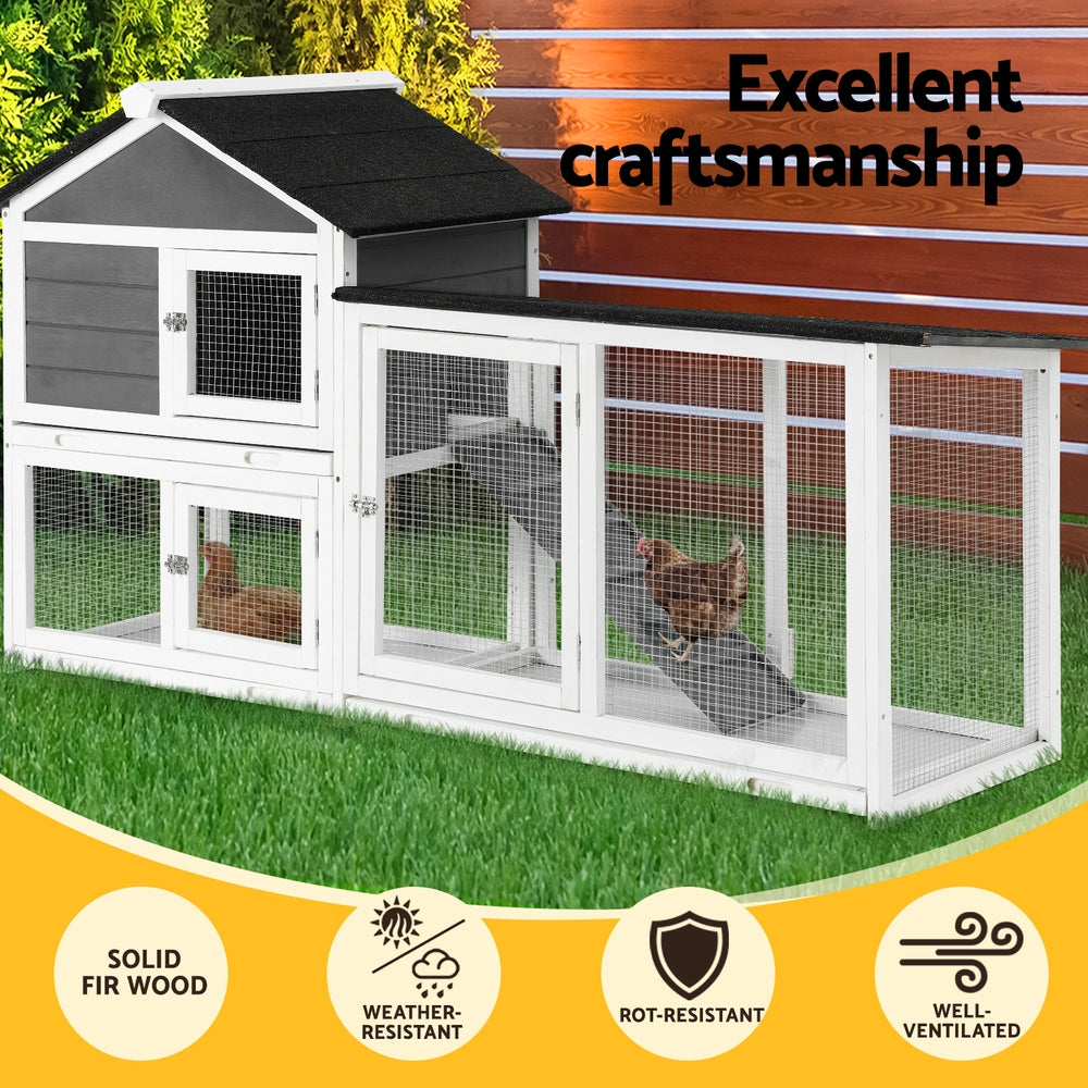Two-level pet cage with solid fir wood construction, weather-resistant design, rot-resistant material, and well-ventilated structure on a grassy background.